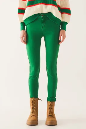 Jeans skinny a vita alta in verde