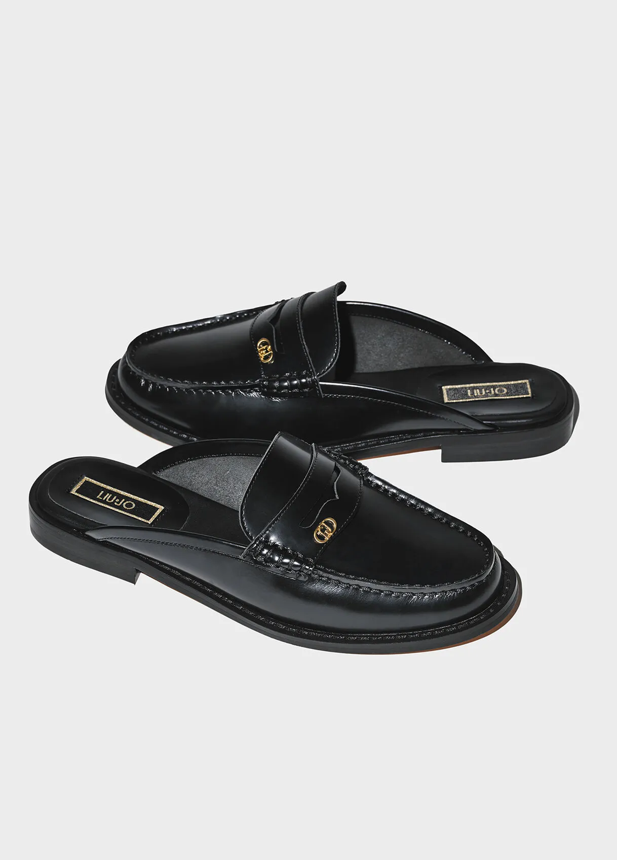 Slippers nere in pelle