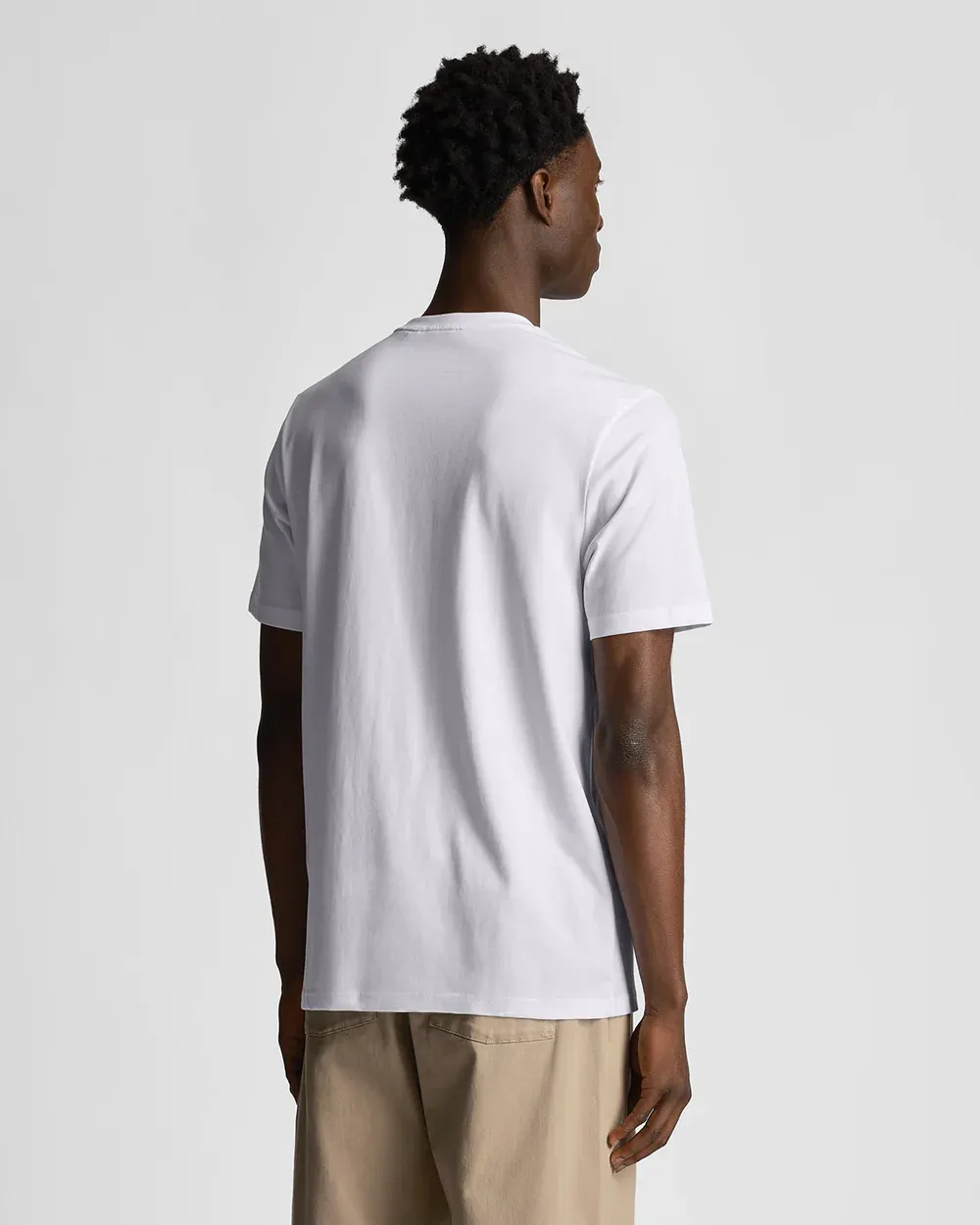 T-shirt mezza manica bianca in cotone con logo aquila tono su tono ricamata sul petto